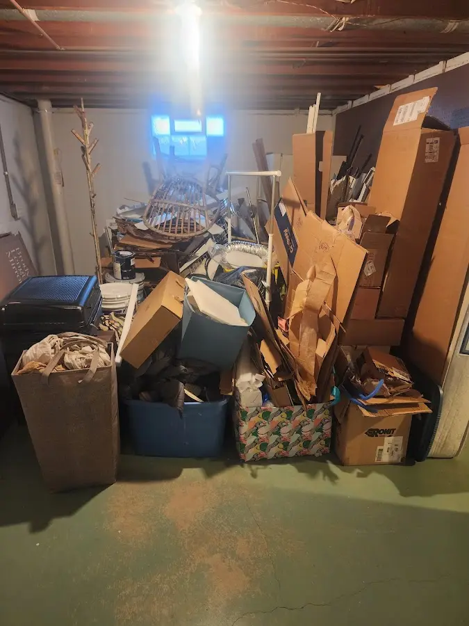 Roll-off dumpster container at job site for Yard Waste Dumpster Rental in Newberry